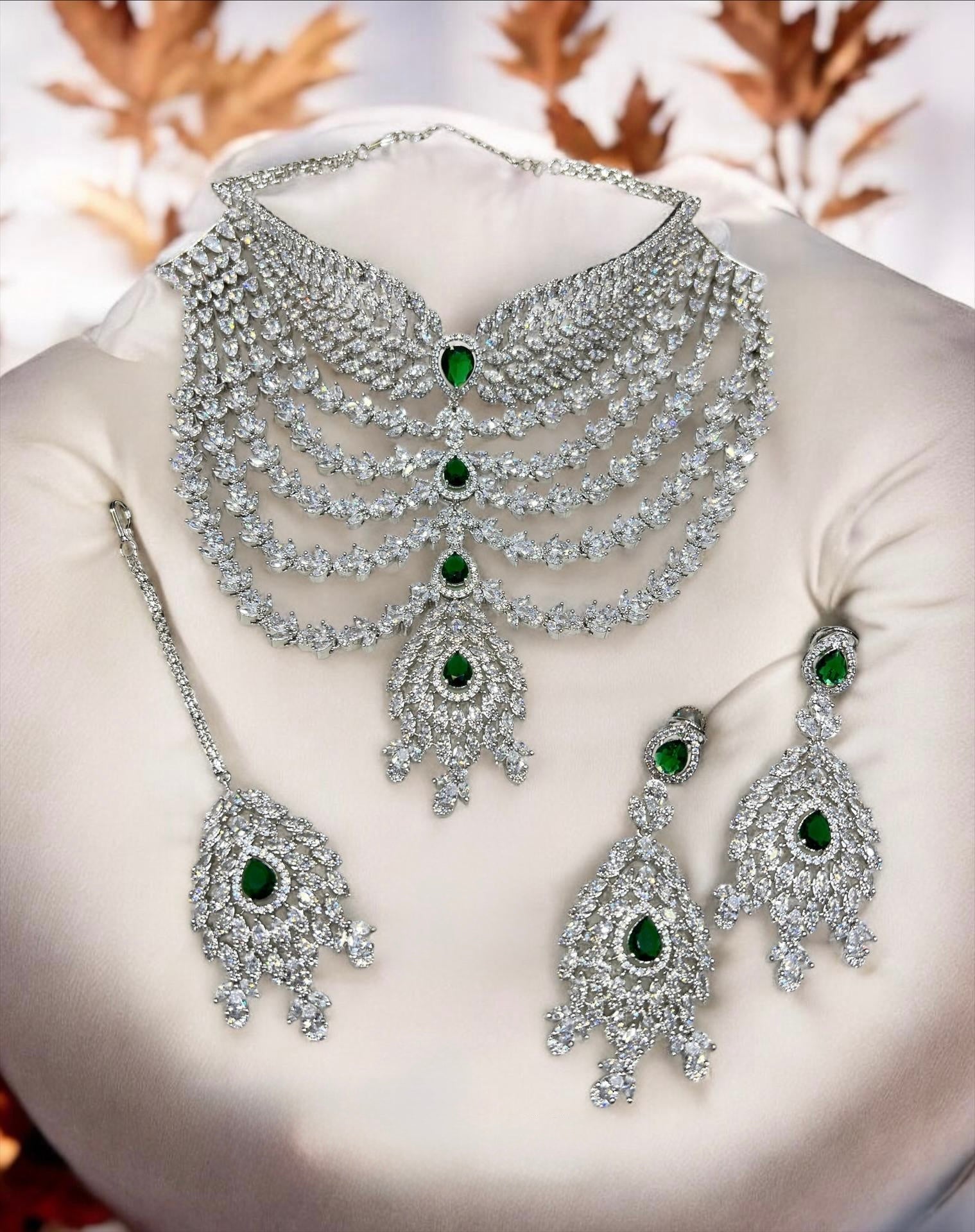 AD Necklaces in Silver Polish with earrings and tika - Aanyaroop